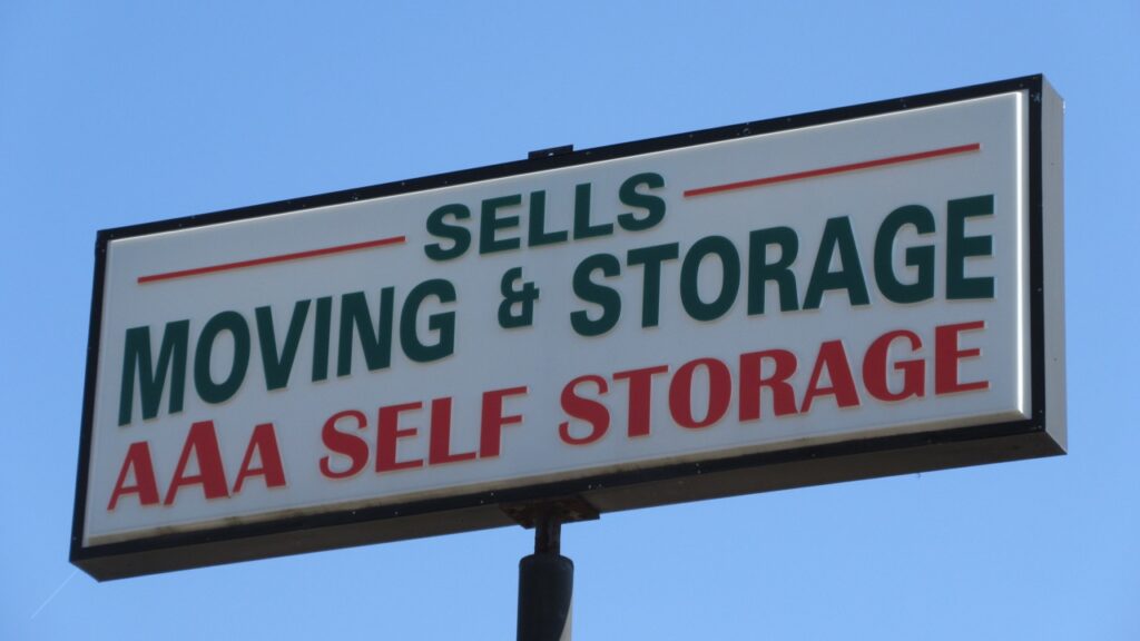 Sells Moving & Storage logo